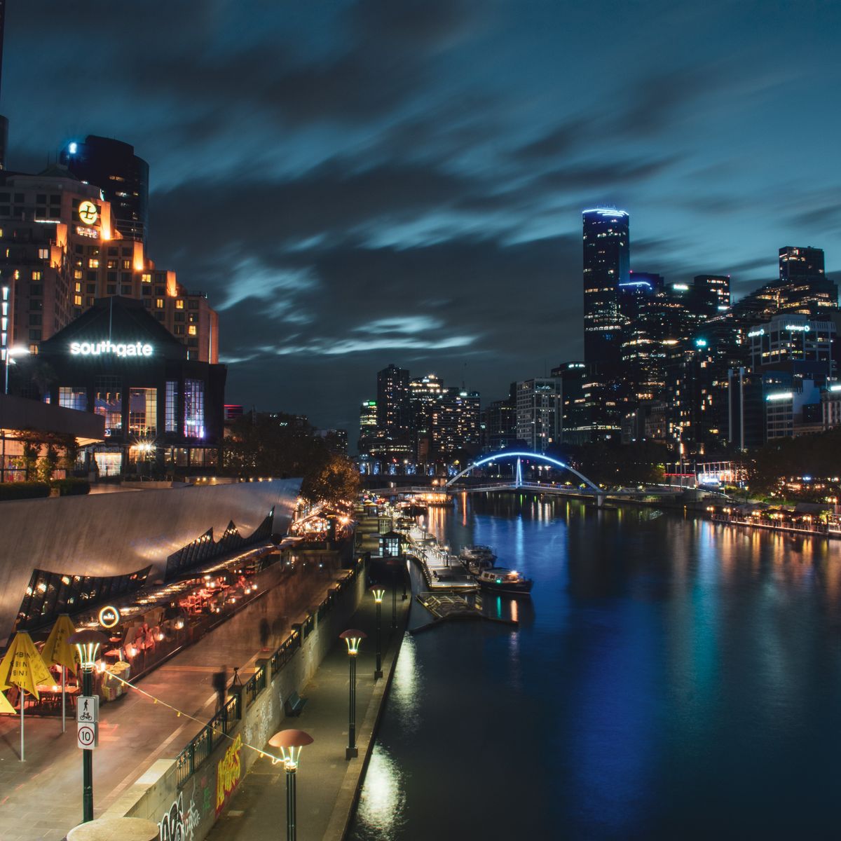Yarra River flowing through downtown Melbourne at night