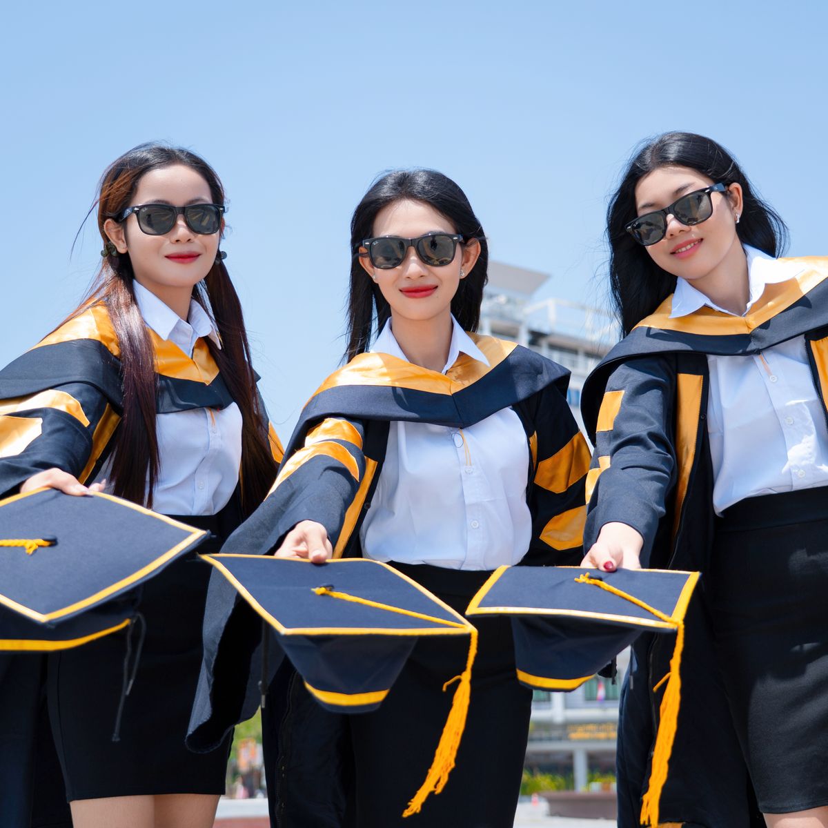 Graduates celebrating outdoors in Australia