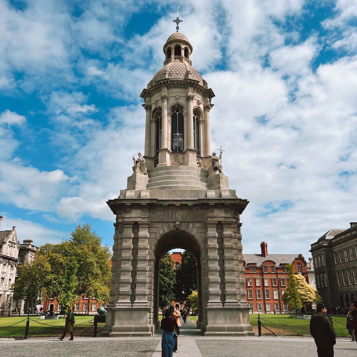 Campanile at Trinity College Dublin under blue skies