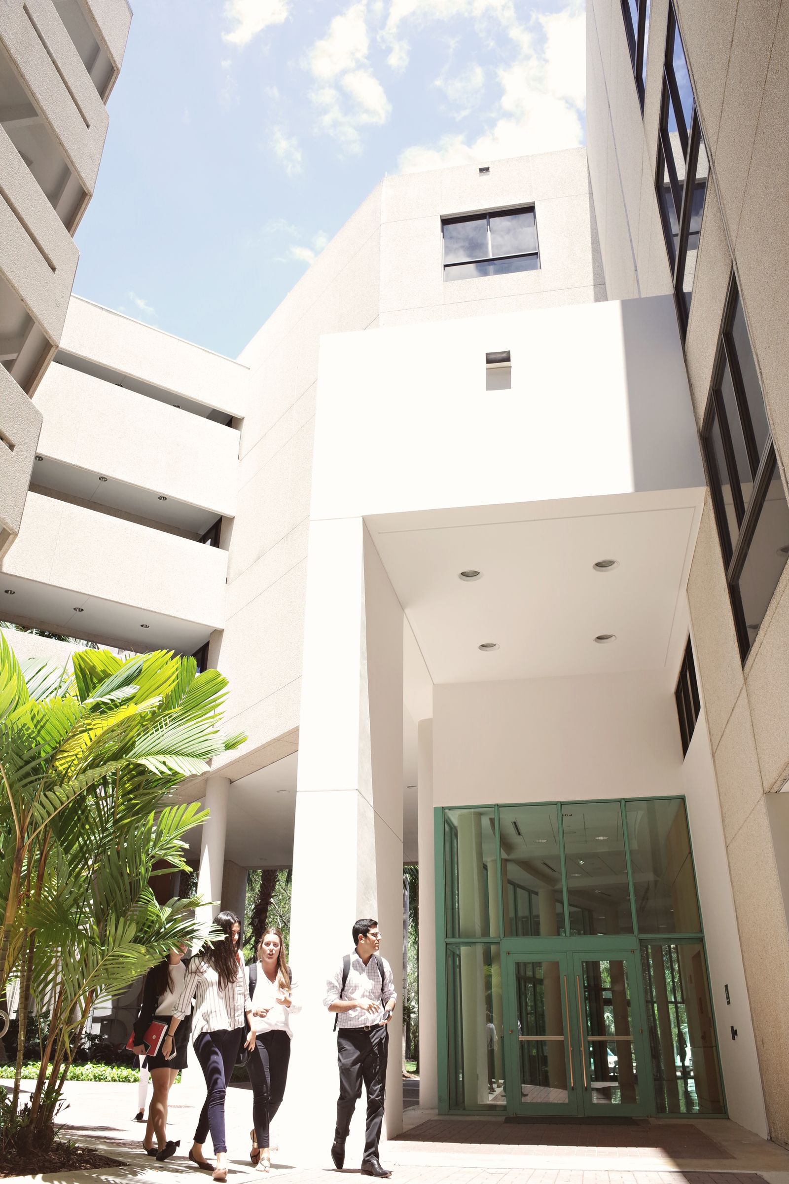 Students on a bright modern university campus
