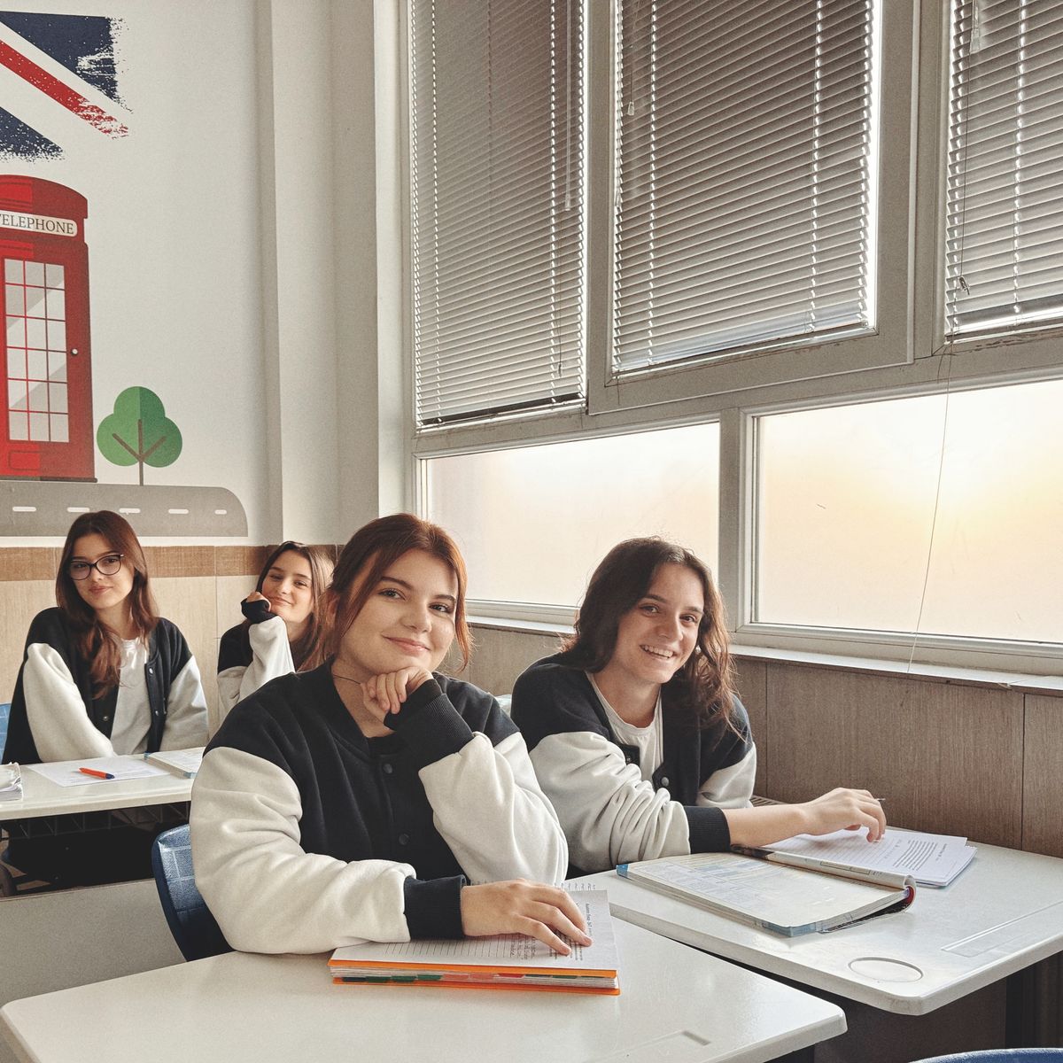 Students studying in a sunlit classroom