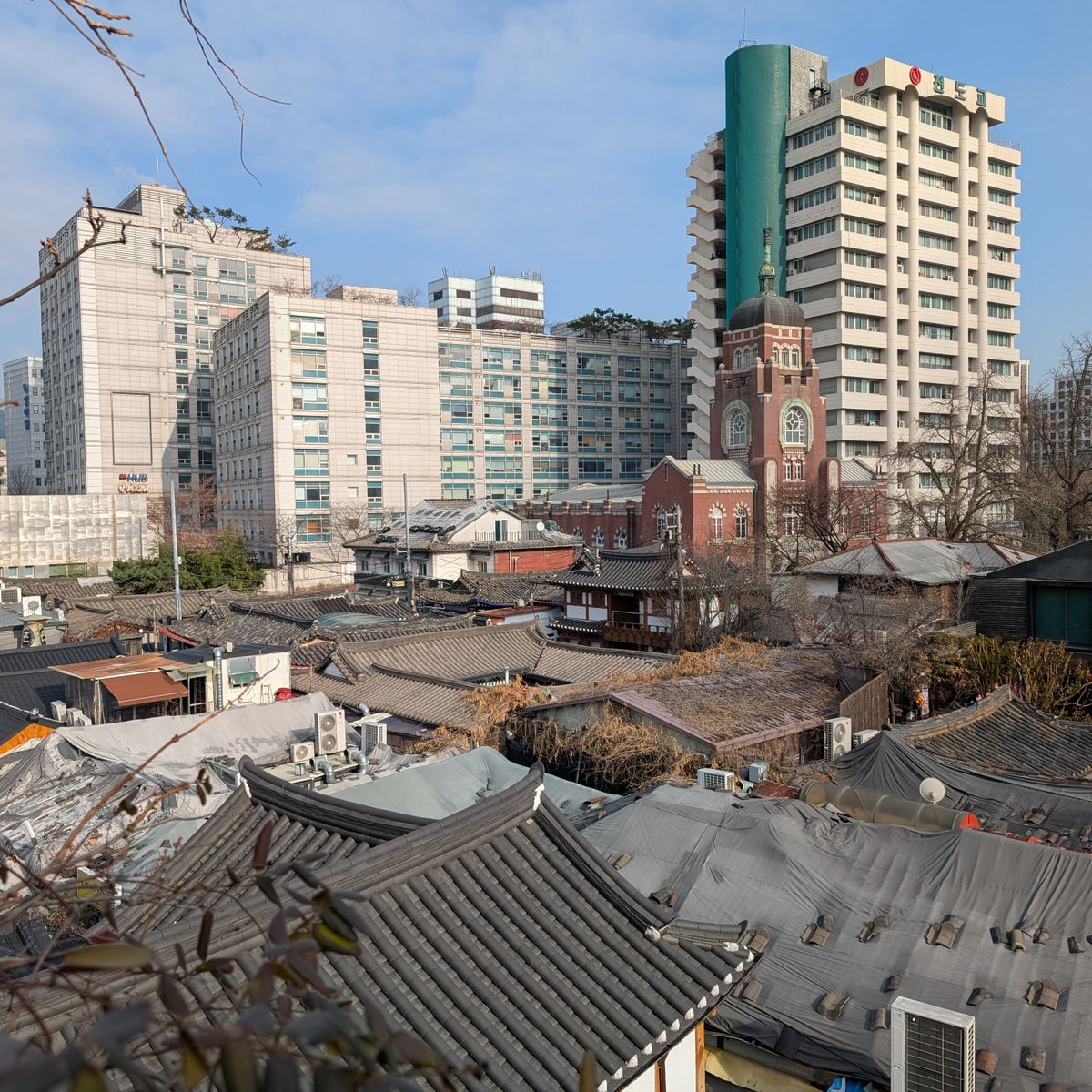 Seoul skyline mixing traditional hanok and modern towers