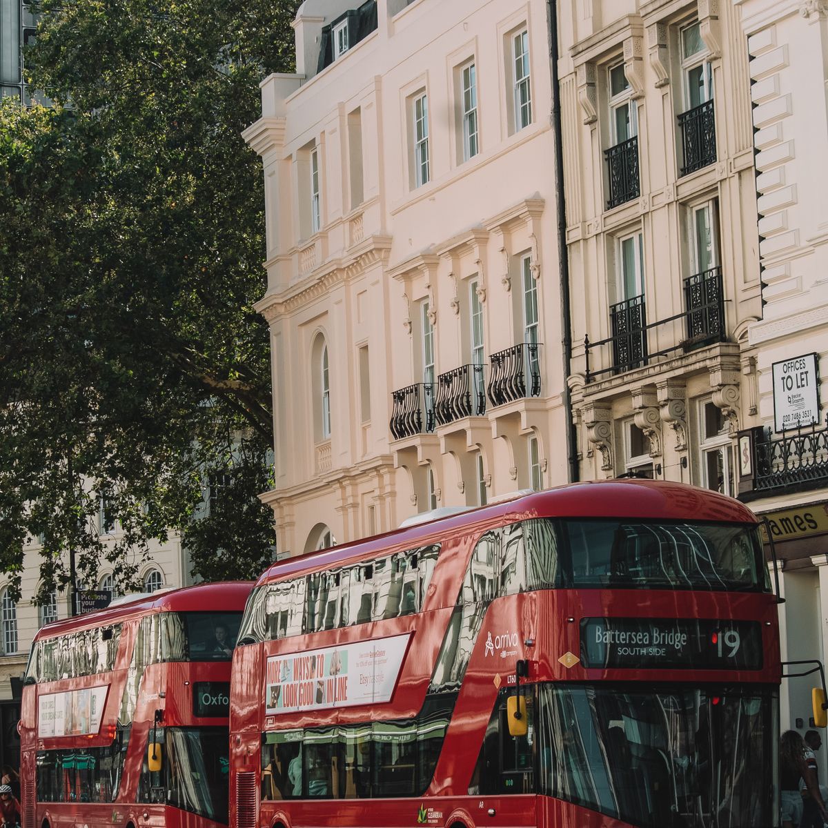 Red double-decker buses on a London street